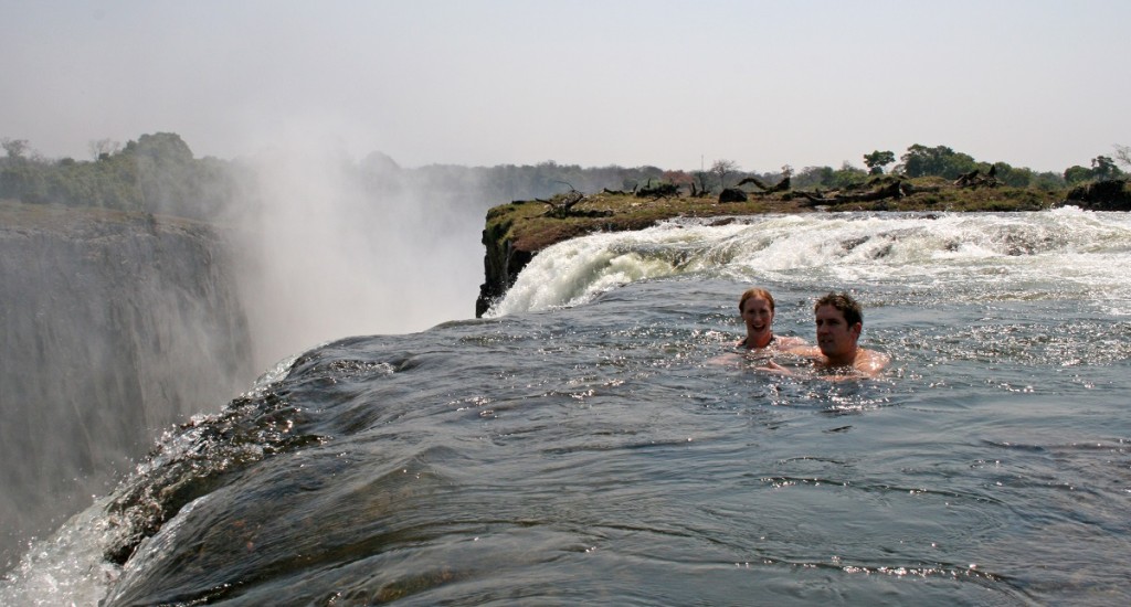 Tourists_swimming_at_Victoria_Falls_Wiki