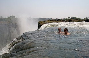 Tourists_swimming_at_Victoria_Falls_Wiki